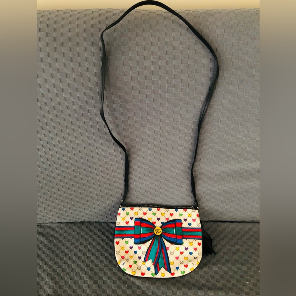 BRIGHTON Collectors*CROSSBODY w/LOVE & JOY BOW design and black tassel NWOT.